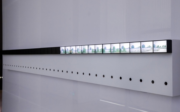 Small screens mounted on a wall