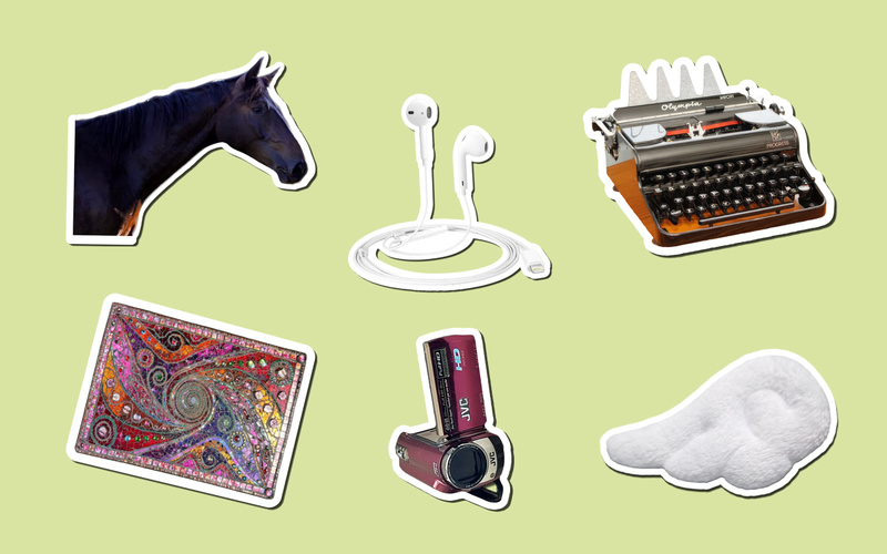 Stickers of horses, clouds, and headphones on a mint-colored background.