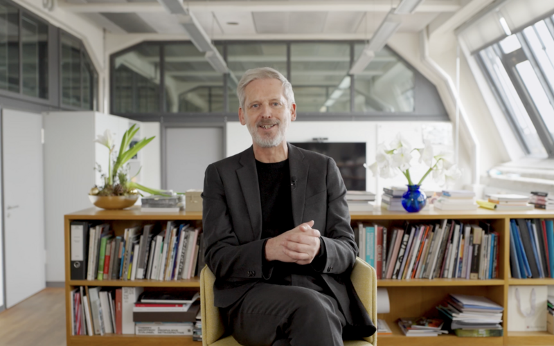 A video thumbnail showing Alistair Hudson in an office.