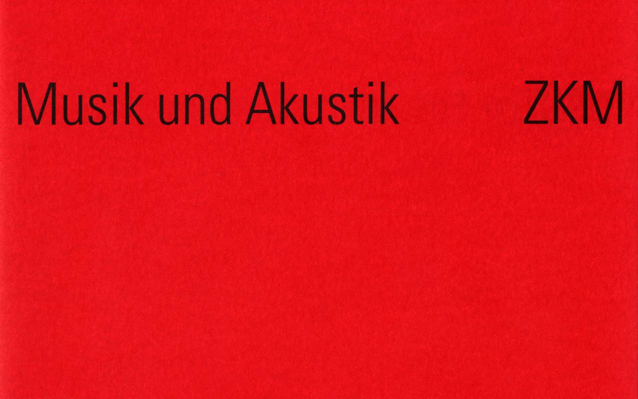 Red cover with black writing.