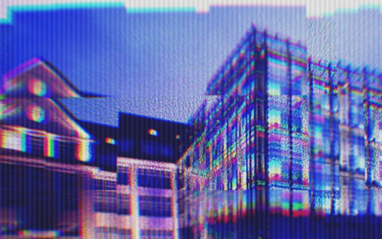 A digitally distorted picture of the ZKM Kubus, taken in the afternoon.