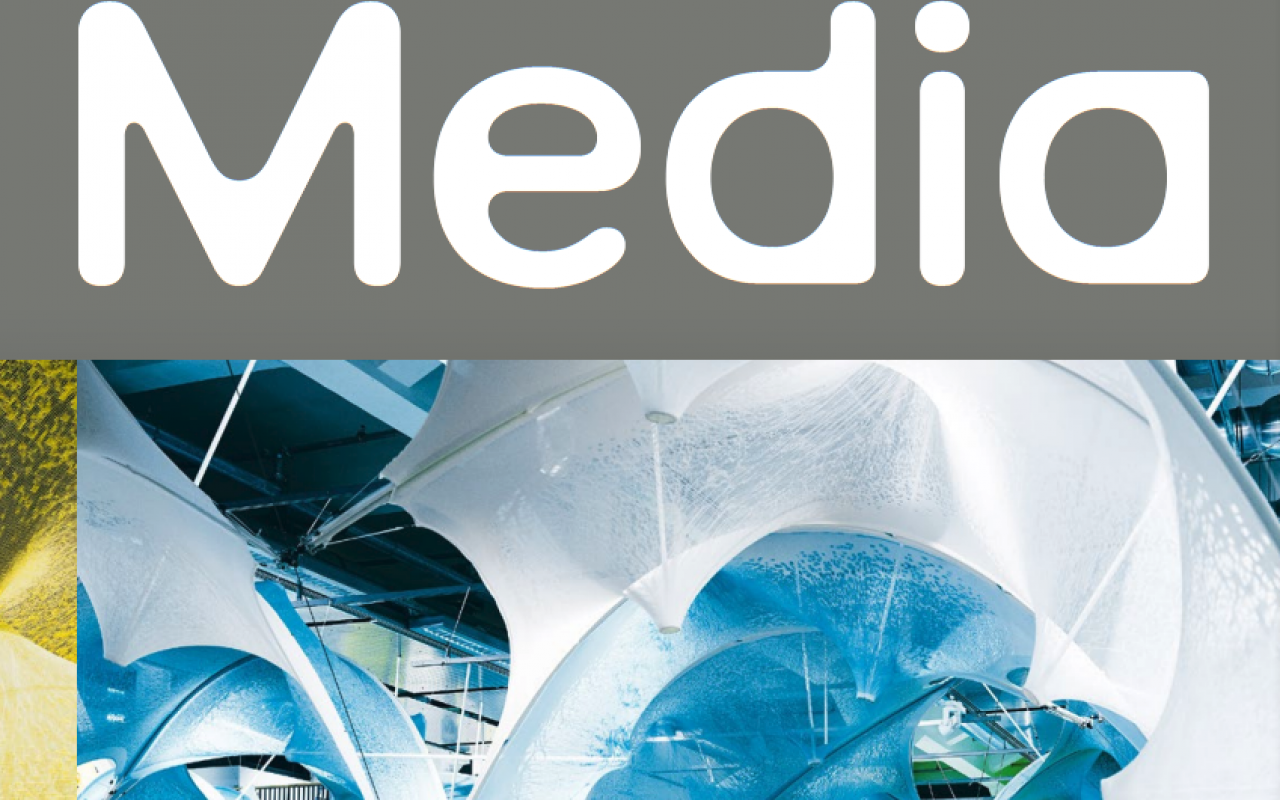Cover der Publikation »Bio Media«, 2023. Blick in einen Ausstellungsraum mit zeltartigen Aufbauten.