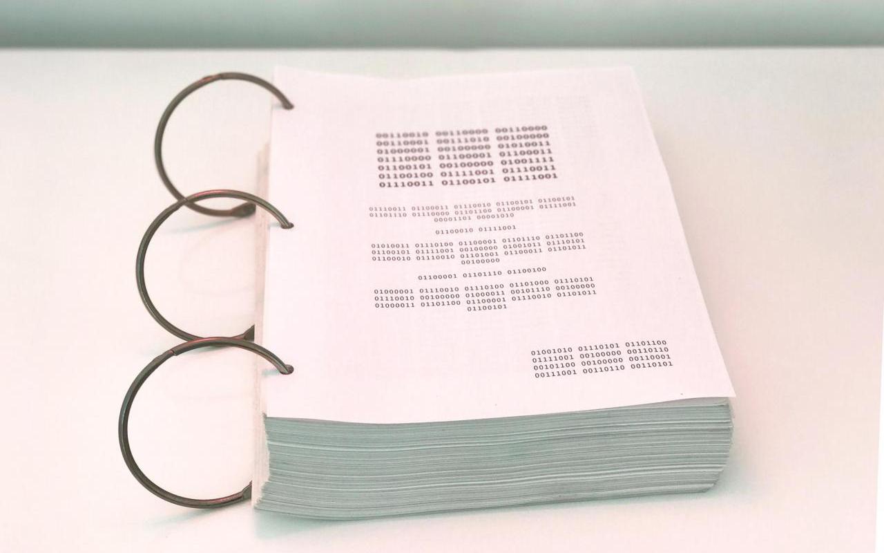 A binary code screenplay with ring binding