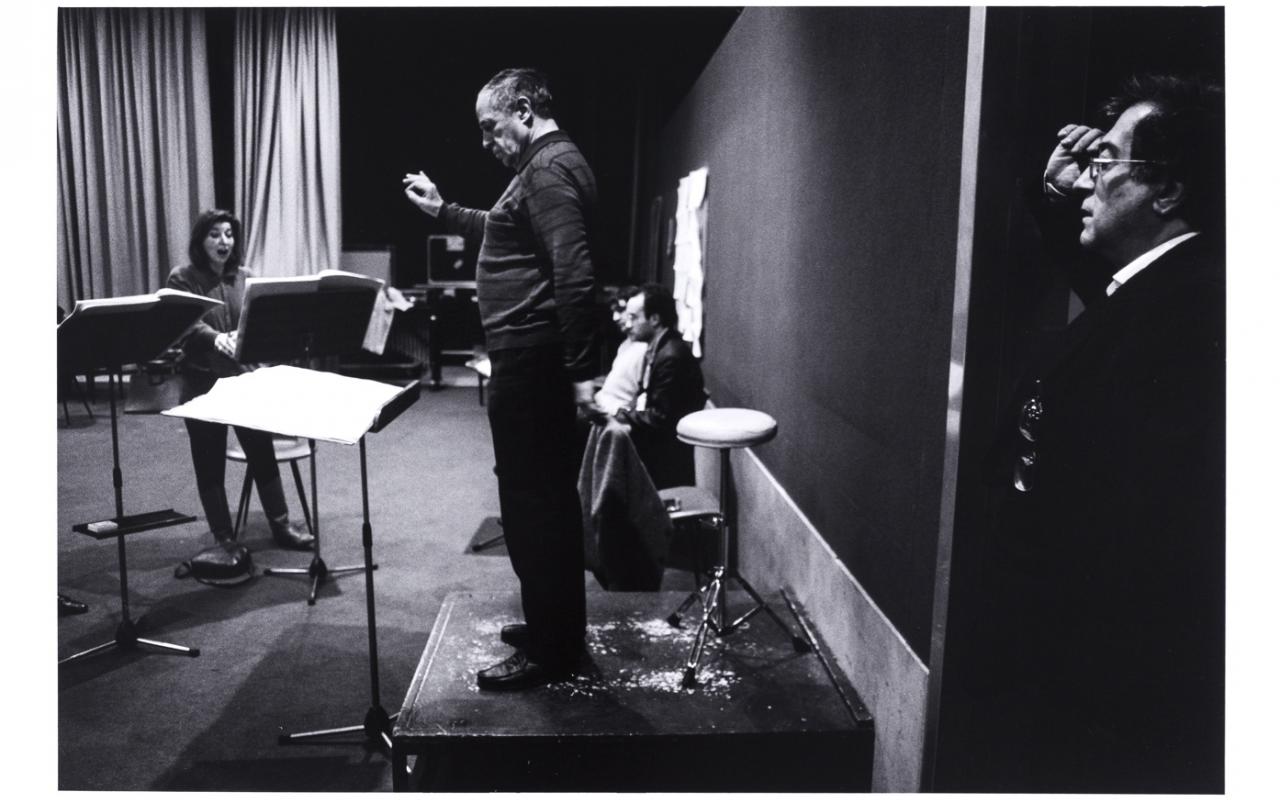 Luciano Berio listening to his piece conducted by Pierre Boulez during rehearsal in Paris