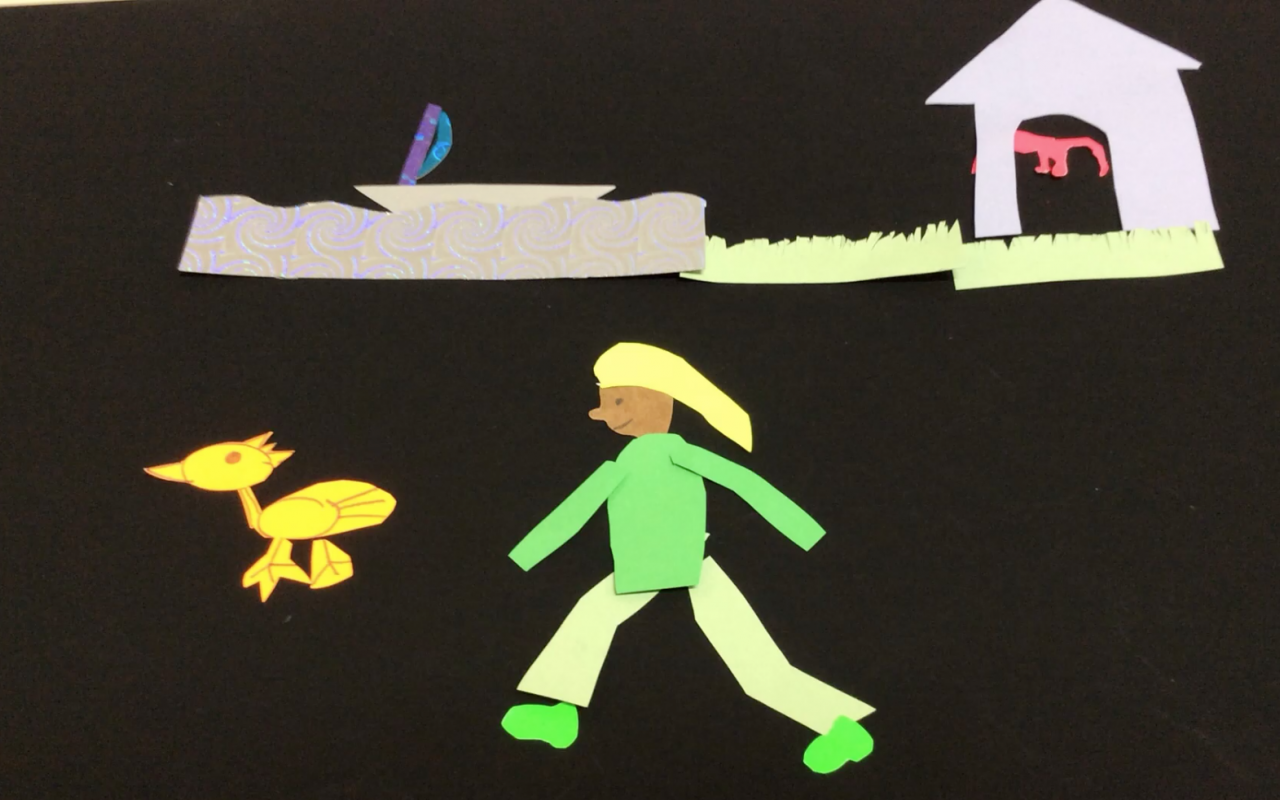 Still of an animation workshop in which a person is running after a little yellow duck.