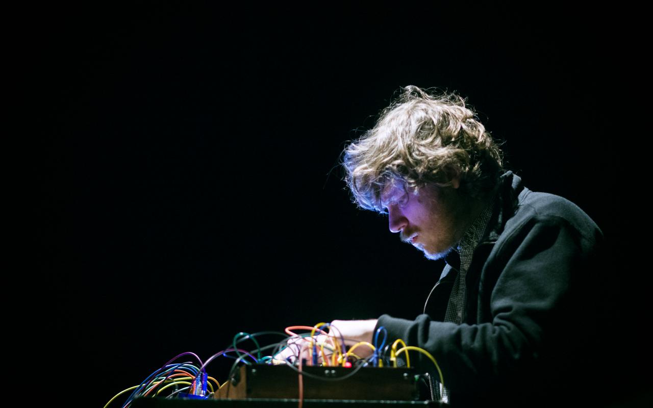 John Chantler synthesizing at a concert 