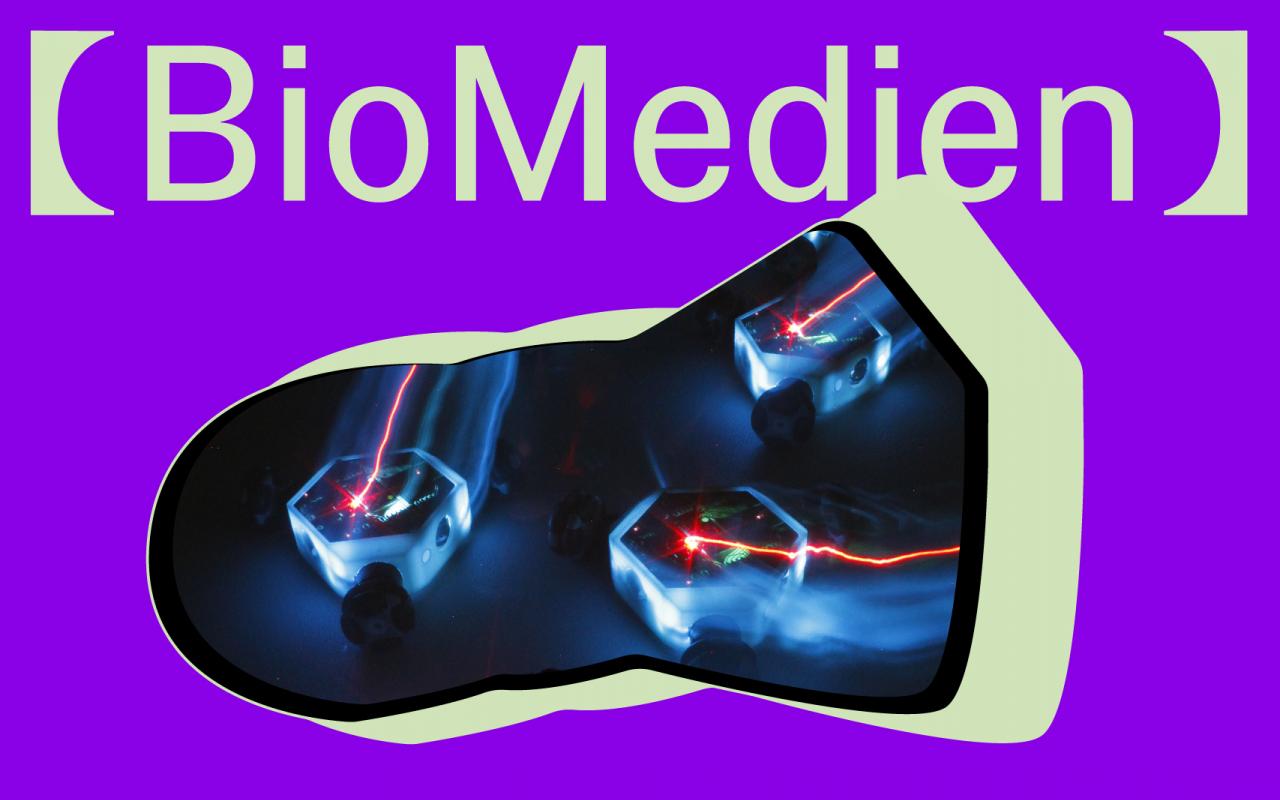 The graphic with purple background shows as a cutout luminous small robot gyroscopes move on a dark background. Above it in pale green is the title "BioMedia".