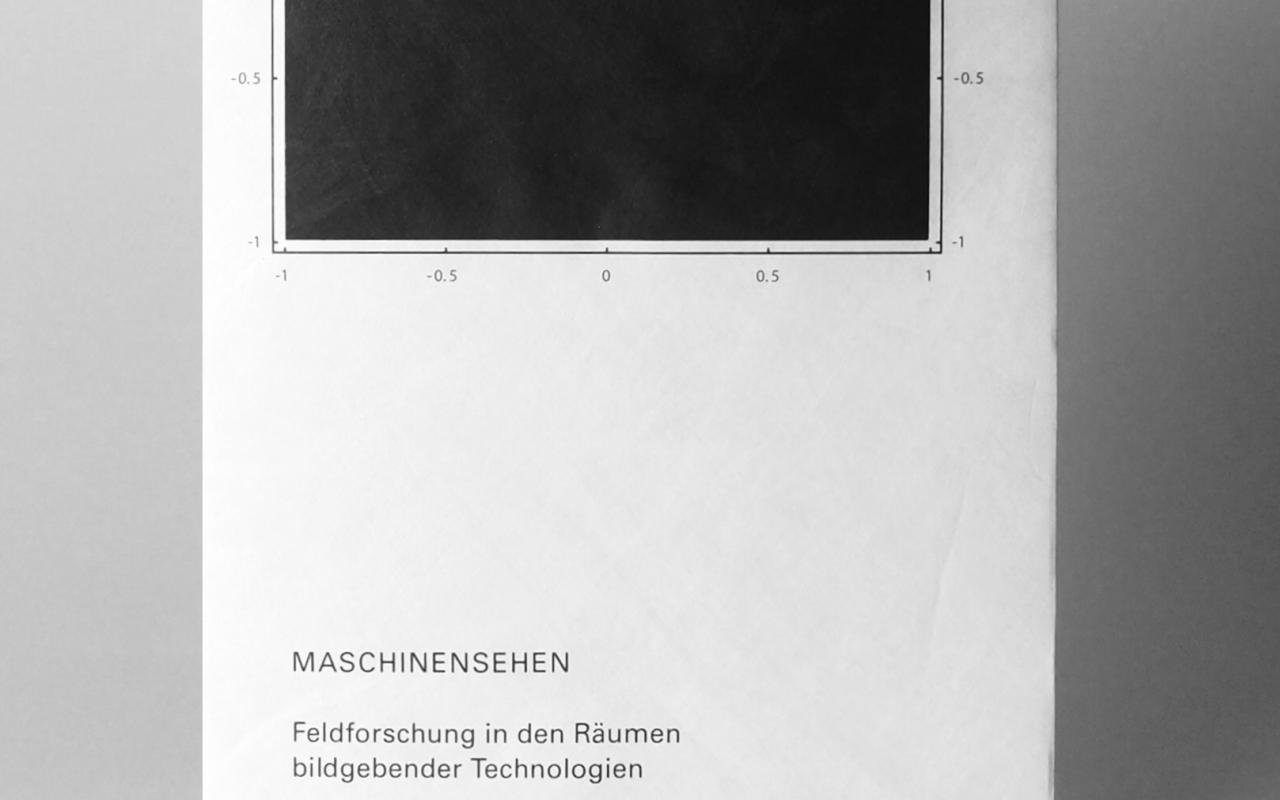 Ein weißes Buchcover mit schwarzer Schrift und einem schwarzen Quadrat.