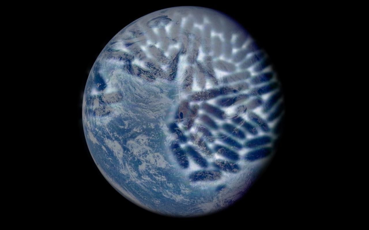 The Earth seen from space. There are traces of bacteria on it.
