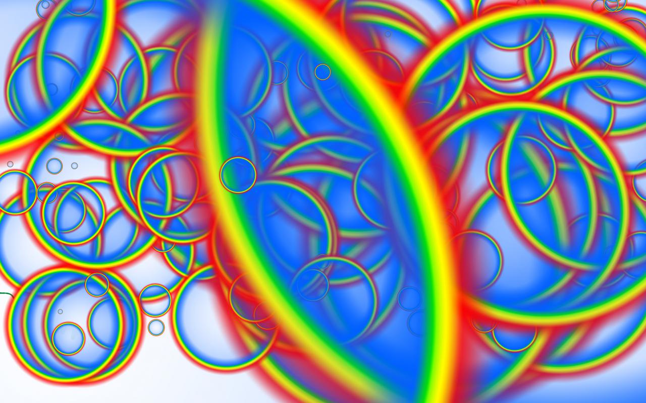 An abstract photoshop-picture of rainbowcoloured circles.