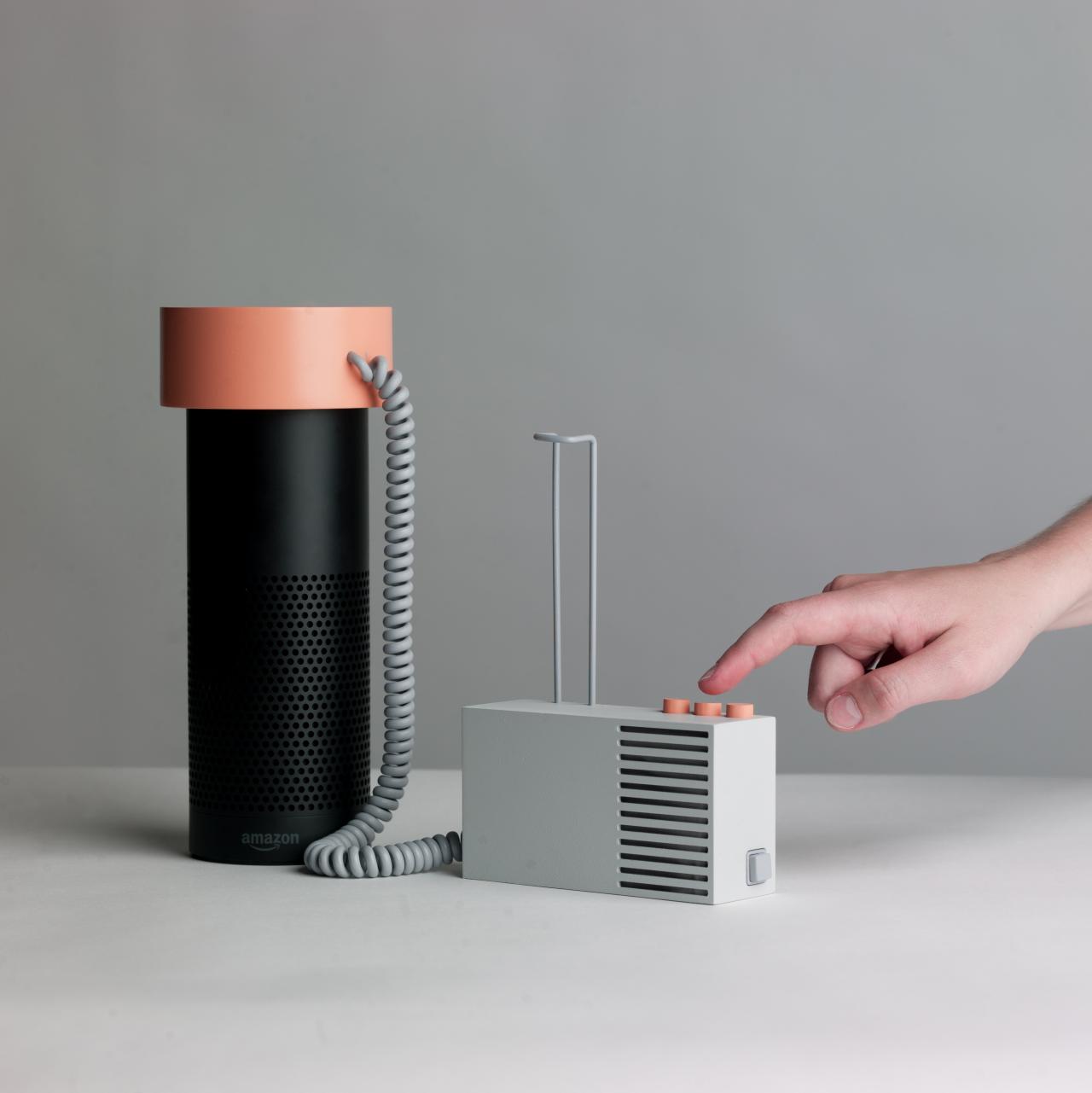 Photo of »Object B – Kidding Alexa« of the work »Accessories for the Paranoid«, Amazon's Alexa is connected to an apparatus with buttons.