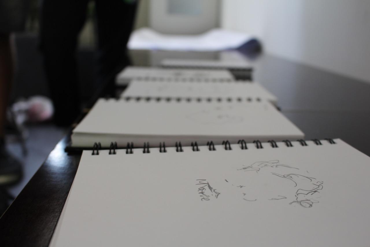 White notepads with sketches
