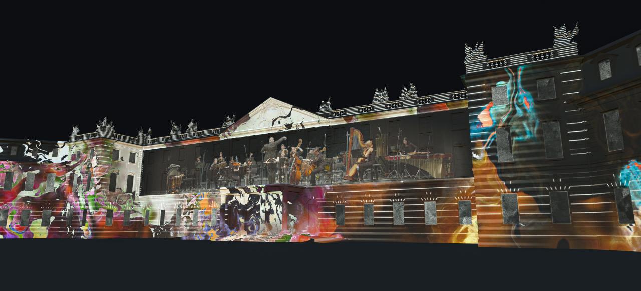 Zu sehen ist eine Visualisierung des beleuchteten Karlsruher Schlosses. Projiziert wurde ein Konzert umgeben von Graffitti-ähnlichen Abbildungen