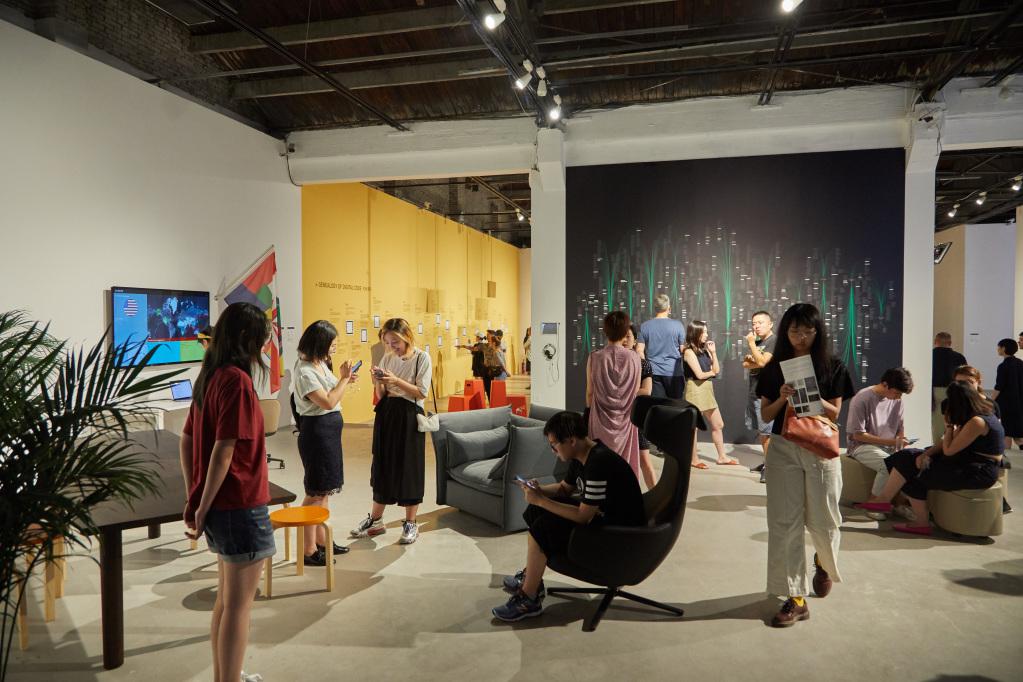 People in an exhibition space