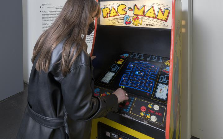 Pac-Man automat in use of a visitor