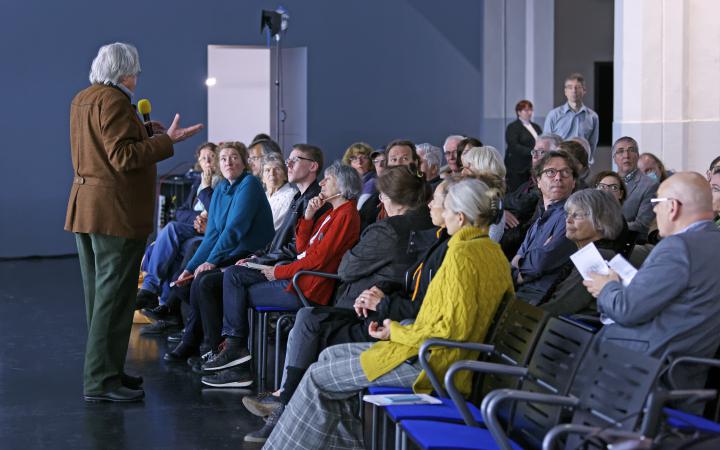 A man talking to the audience