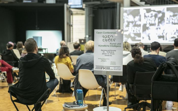 The picture shows the Open Conference about Art and Artificial Intelligence