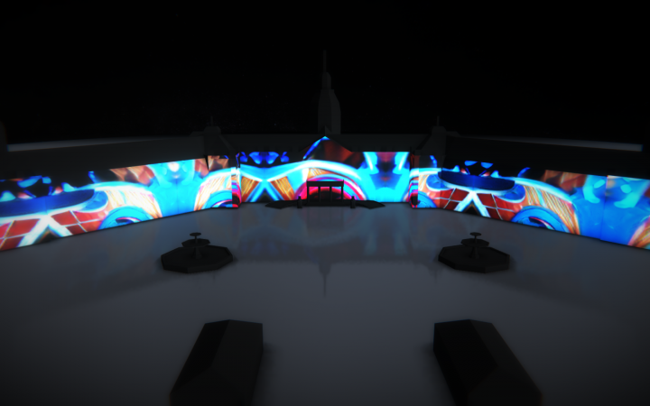Zu sehen ist eine Visualisierung des beleuchteten Karlsruher Schlosses. Projiziert werden bunte Ornamente