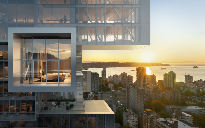 In the foreground of the picture you can see a large and very modern building. In the background you can see the city and the many other buildings and a lake. The sun is just setting and shines through the angles of the house.