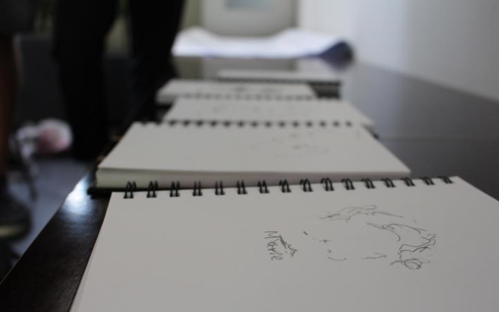White notepads with sketches
