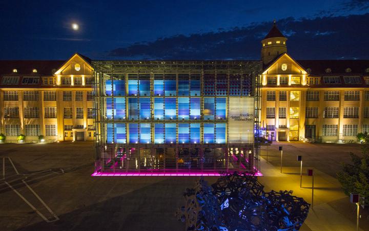  The picture shows the illuminated ZKM building at night