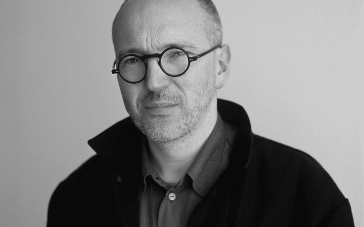A black and white portrait of the artist Ecke Bonk