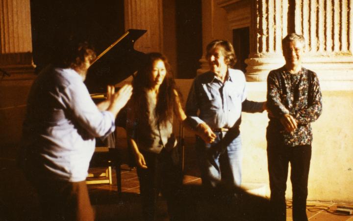 Soun-Gui Kim is seen with guests at a John Cage concert.