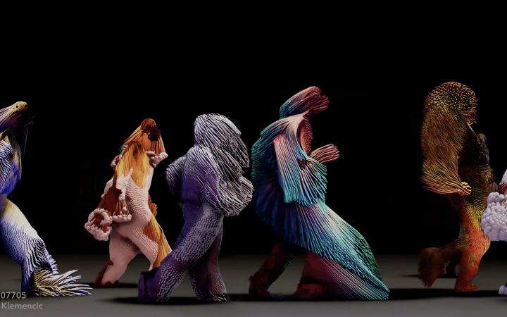 Human-like beings, made of colourful, fabric-like materials and fringes, walk in a row from left to right.