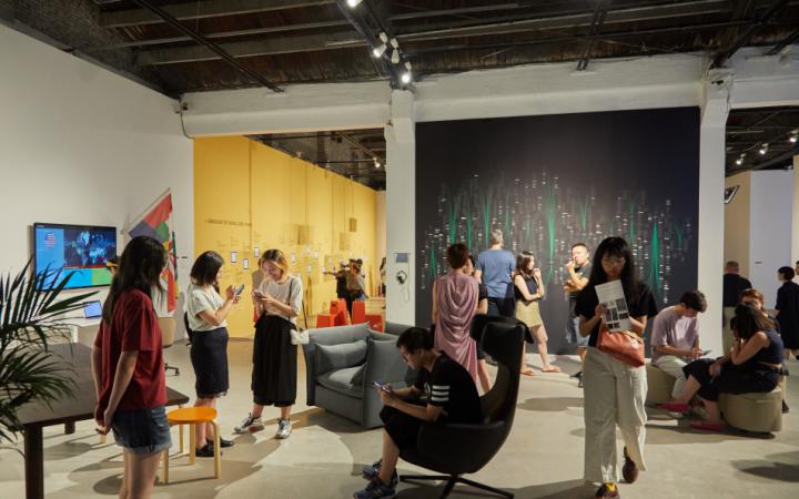 People in an exhibition space