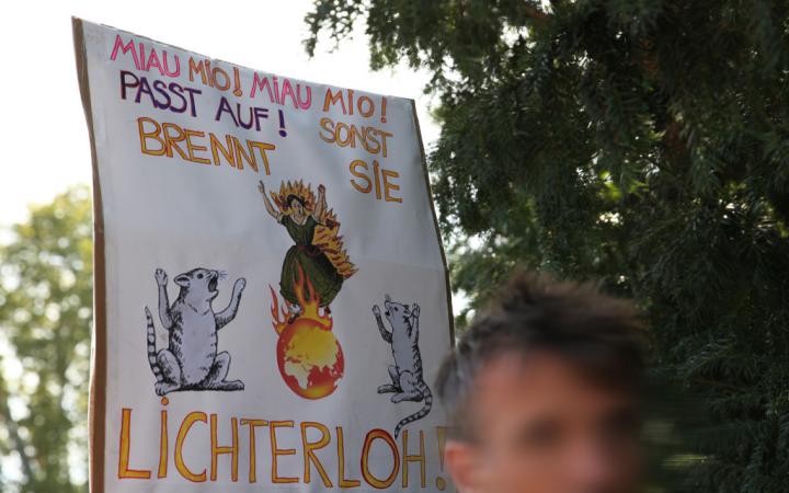 The poster shown was held up by students during the Fridays for Future demonstration on 20 September 2019. It shows a burning globe.