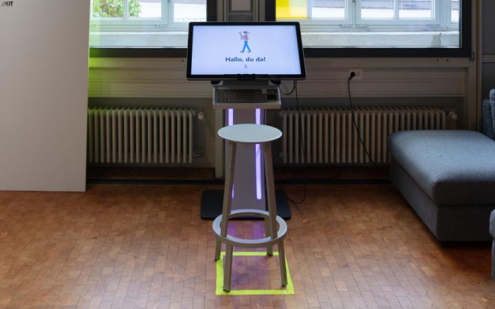 Eye tracking kiosk: touch screen with stool