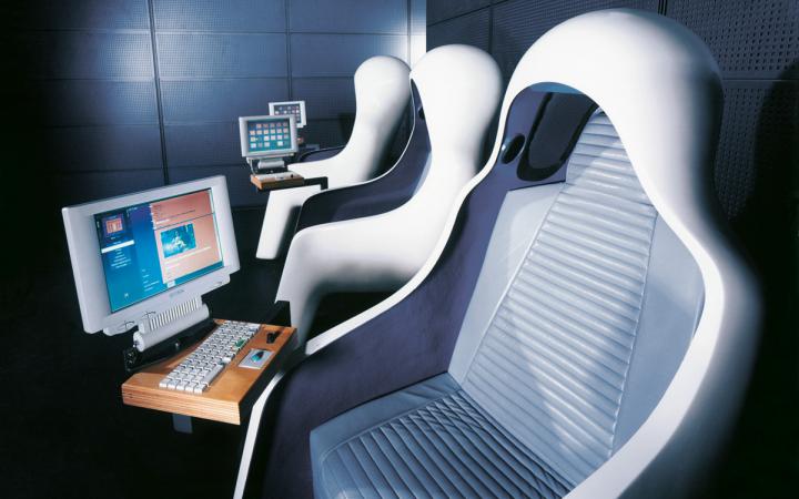 White hearing seats with a monitor