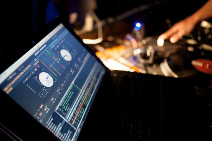 A laptop. A program for DJs is open
