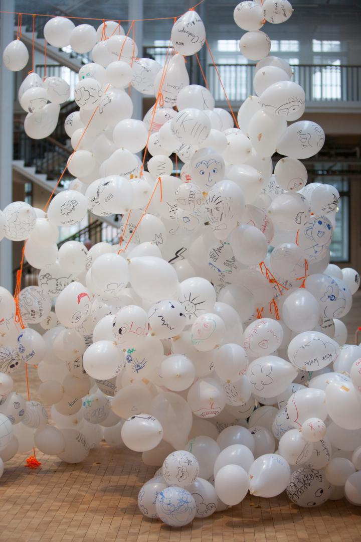 Many painted white balloons