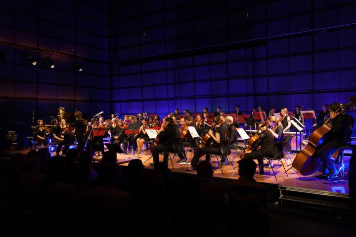 An orchestra at the stage