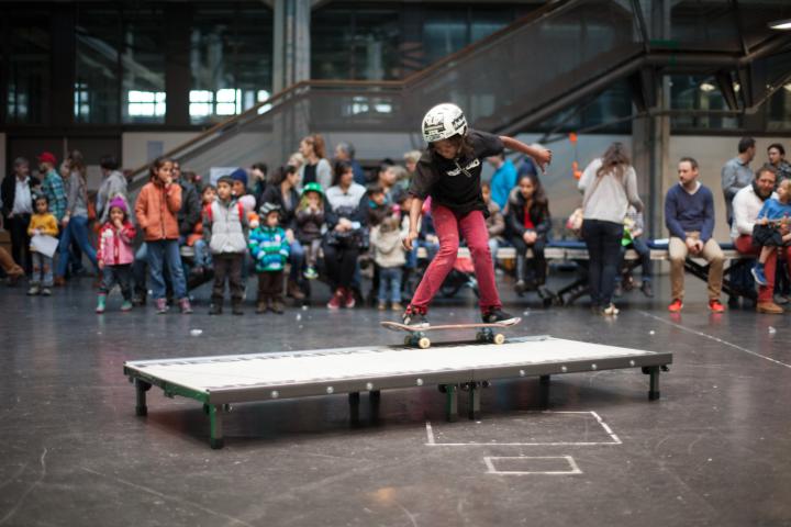 A girl riding the skateboard