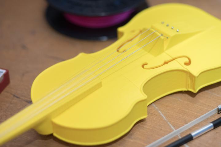 A yellow violin from the 3D printer