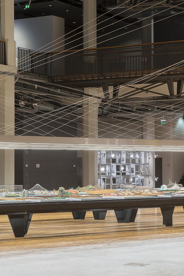 View into the Frei Otto exhibition: An extra long table with models by Frei Otto