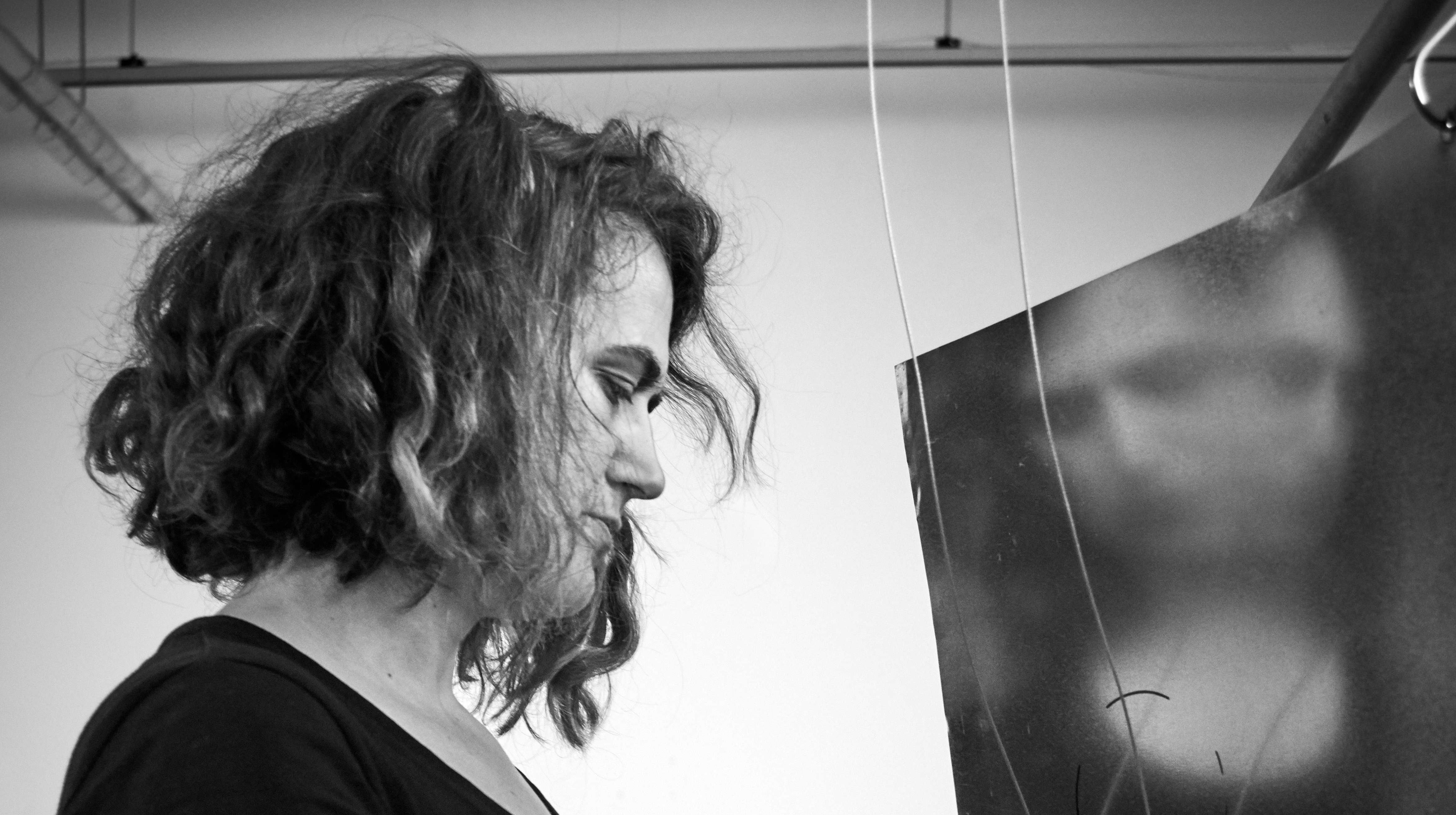 Silvia Rosani looks downwards.