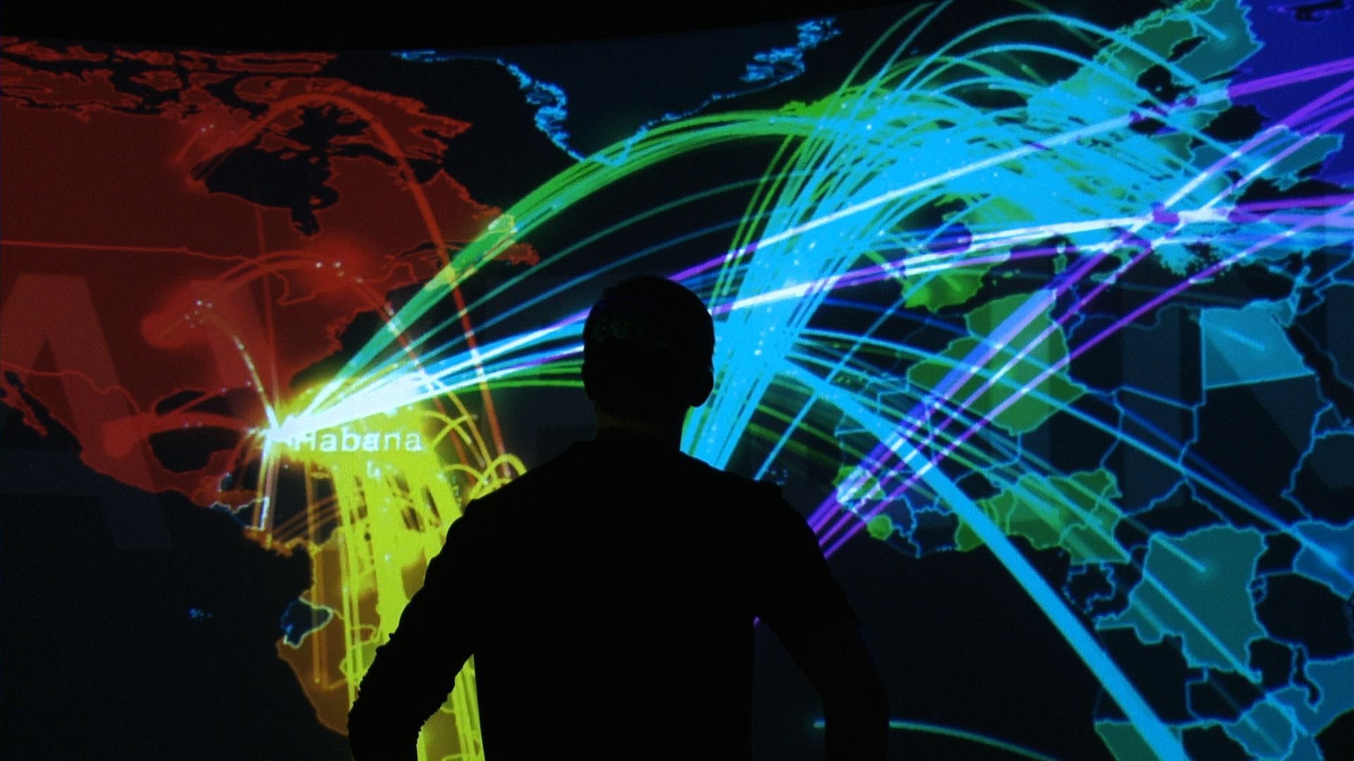 Shadow of a persons in front of a panorama screen which is showing trans_actions