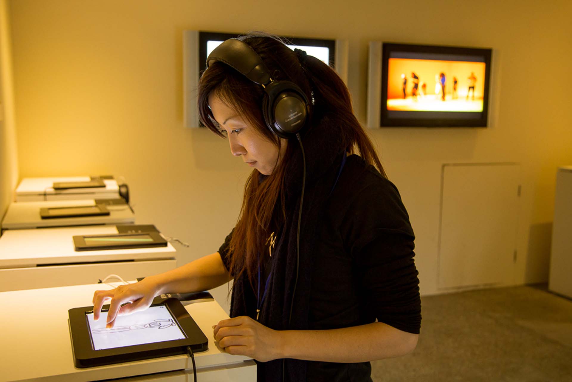 A woman uses an Ipad