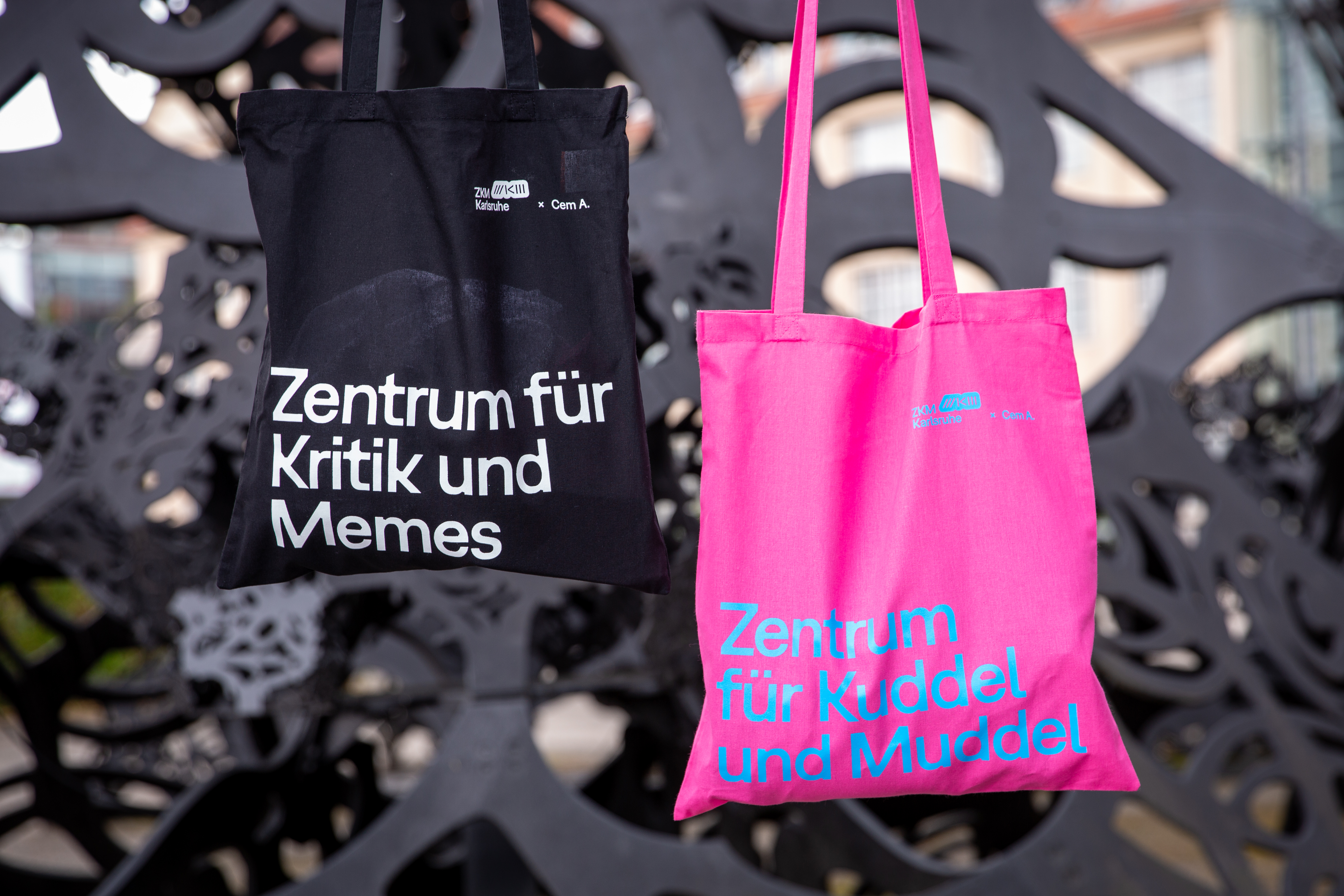 You can see two cloth bags with an inscription. 