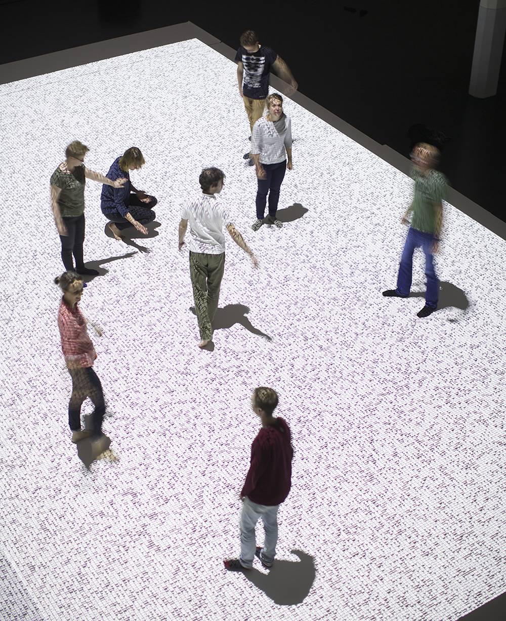 People dancing on a datamatrix