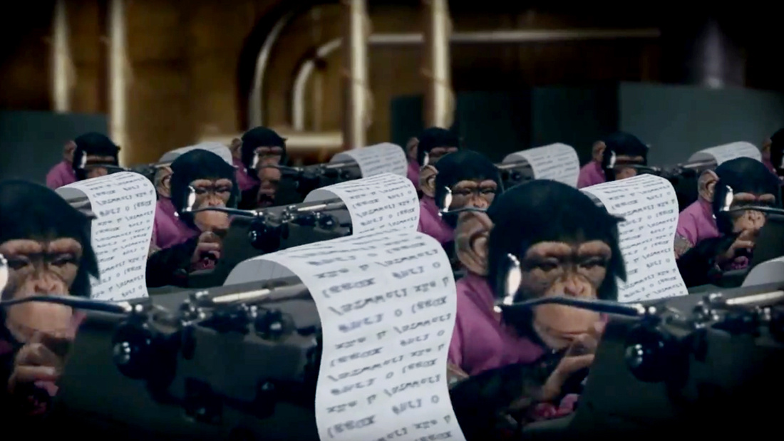 Chimpanzees sit at typewriters