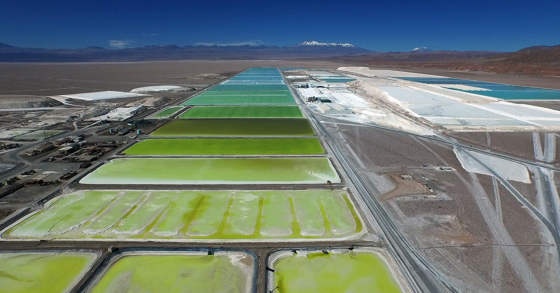 Unknown Fields camera drone flies above the Atacama Desert to map the process of Lithium brine being refined through a landscape of evaporation ponds. 