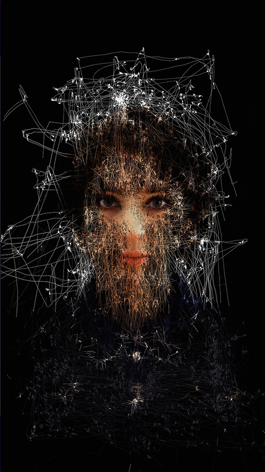 The artwork shows a scattered woman's face.
