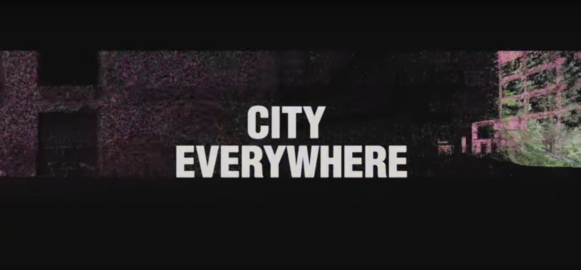 The lettering "City Everywhere" against a black background with an industrial building.