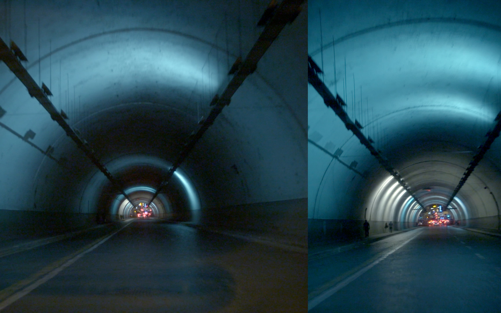 You can see two tunnels. At the end of the tunnel there are red lights. The image is blue, black.