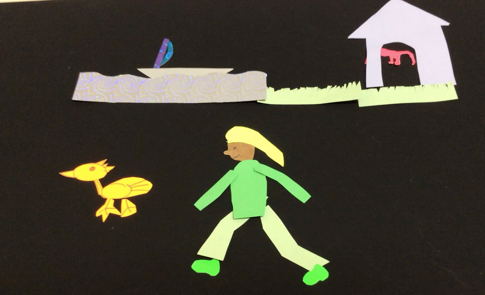 Still of an animation workshop in which a person is running after a little yellow duck.