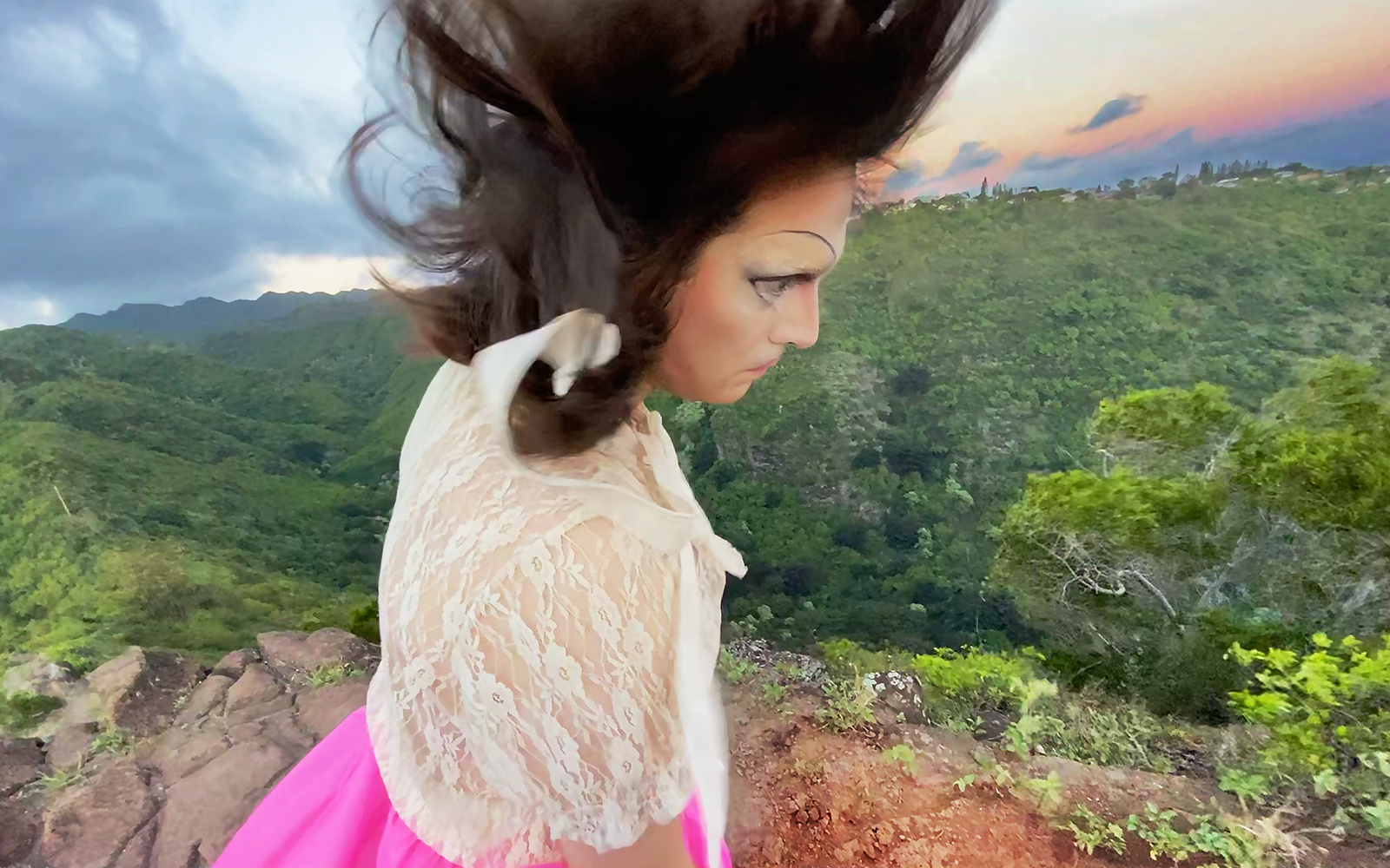 The picture shows a slanted figure standing on a slope